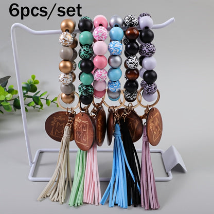 MAMA Wooden Bead Keychain Set 6pcs – Printed Wooden Plaque Charm, Tassel Wrist Key Ring, Anti-Loss Car Keychain & Backpack Accessory, Perfect Mother's Day & Holiday Gift for Mom